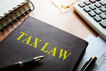 Tax law on a table. Taxation concept. Moretsky Law Tax Law